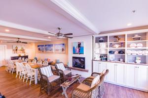 a dining room with a table and chairs at On the Beach Bed and Breakfast in Cayucos