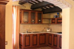 Η κουζίνα ή μικρή κουζίνα στο Villa Melagrana