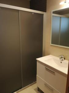 Kúpeľňa v ubytovaní Fantástico apartamento en primera línea de mar + 12 fotografií