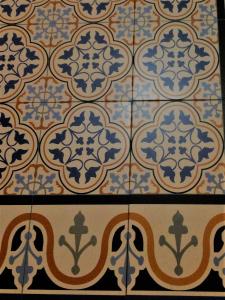 a tile floor with blue and white tiles on it at Da Irene al Centro Storico in Marsala