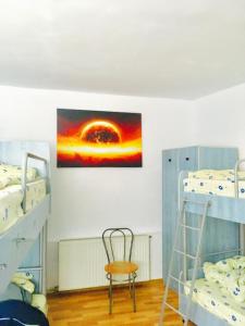 Postel nebo postele na pokoji v ubytování Rolling Stone Hostel
