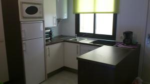 Kuchnia lub aneks kuchenny w obiekcie Apartamento Ayamonte golf Costa Esuri