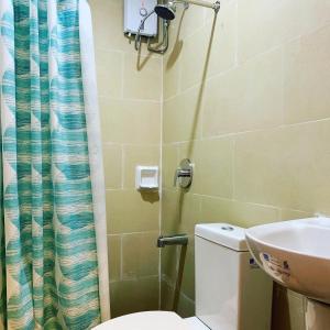 Koupelna v ubytování Davao Persimmon Suites + 16 fotografií