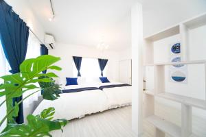 Postel nebo postele na pokoji v ubytování Awaji Seaside Resort in Iwaya 3000 + 62 fotografií