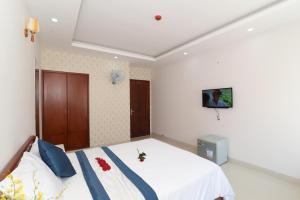 TV a/nebo společenská místnost v ubytování Kyo Hotel