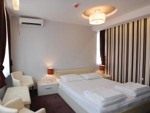 Postelja oz. postelje v sobi nastanitve Holiday Park CFK