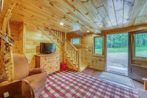 Prostor za sedenje u objektu Log Cabin Escape