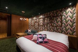 Cama ou camas em um quarto em HOTEL FARINA DOLCE (Adult Only)