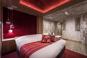 Postel nebo postele na pokoji v ubytování HOTEL FARINA DOLCE (Adult Only)
