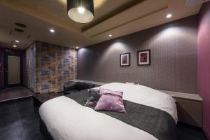 Postel nebo postele na pokoji v ubytování HOTEL FARINA DOLCE (Adult Only)