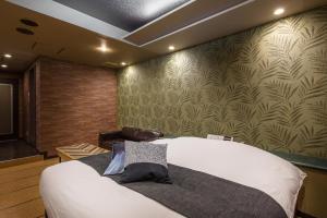 Postel nebo postele na pokoji v ubytování HOTEL FARINA DOLCE (Adult Only)