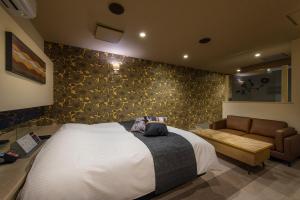 Postel nebo postele na pokoji v ubytování HOTEL FARINA DOLCE (Adult Only)