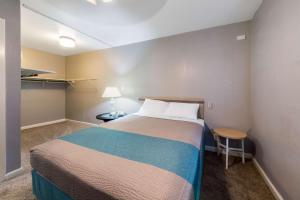 En eller flere senger på et rom på Motel 6-Victoria, TX