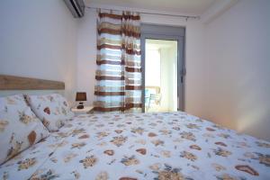 Voodi või voodid majutusasutuse Apartment Dobrota toas