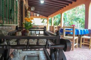 a room with a table and a pool of water at Casa La Potranca in Puerto Vallarta