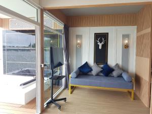 Posezení v ubytování Raya Buri Resort Kanchanaburi