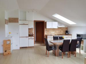 Kuchyň nebo kuchyňský kout v ubytování Ferienwohnung Spachtholz