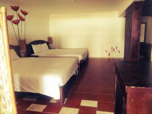 A bed or beds in a room at Mishe B&B也可包棟民宿