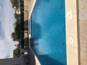Bazén v ubytovaní Fantastico bajo con Jardin en Playa de Canet alebo v jeho blízkosti