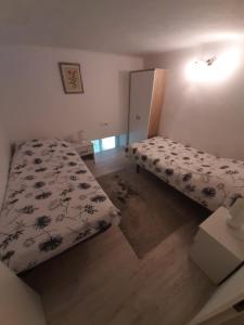 Ein Bett oder Betten in einem Zimmer der Unterkunft Apartment Osk