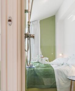 Posteľ alebo postele v izbe v ubytovaní Villa Arillà con piscina e padel