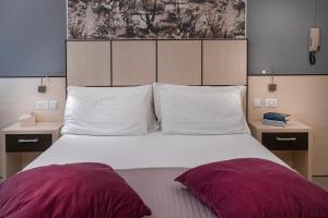 Postel nebo postele na pokoji v ubytování Albergo Aurora