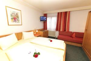 Voodi või voodid majutusasutuse Hotel Mitterer toas