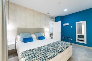 Cama ou camas em um quarto em Holiday Club Playa Amadores