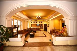 Posezení v ubytování DOM Himalaya Hotel