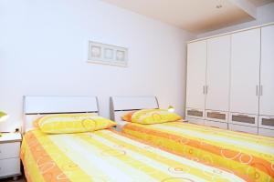 Cama o camas de una habitación en Apartments Armonia