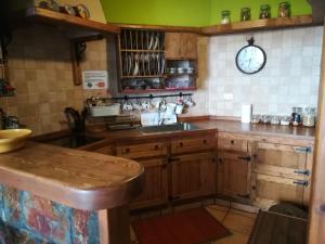 Kuchnia lub aneks kuchenny w obiekcie La Casita del acantilado