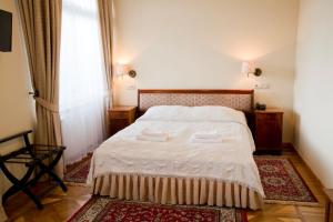 Posteľ alebo postele v izbe v ubytovaní Hotel Polonia