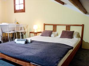Ліжко або ліжка в номері Villa Santini