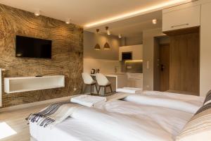 Posteľ alebo postele v izbe v ubytovaní Royal Hill Residence