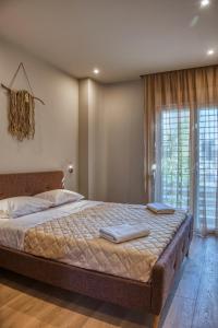 Posteľ alebo postele v izbe v ubytovaní Keramikos Comfortable Apartment #3