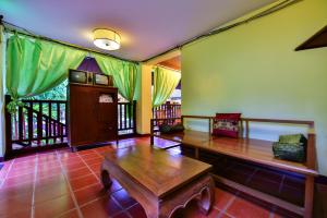 Posezení v ubytování Xishuangbanna Elephant Home Guesthouse