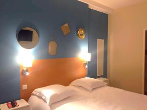 Giường trong phòng chung tại Le Clocher de Rodez Centre Gare