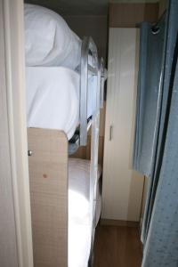 Letto o letti in una camera di Chalet De Duinberg