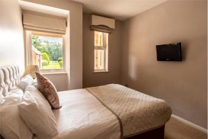 صورة لـ Donington Park Farmhouse Hotel في كاسل دونينغتون