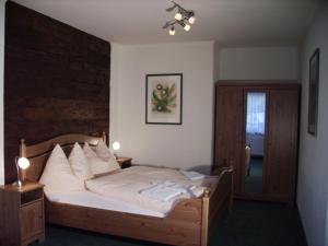 Katil atau katil-katil dalam bilik di Pension Heidi