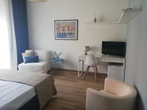 Телевизор и/или развлекательный центр в CASA DE MAR