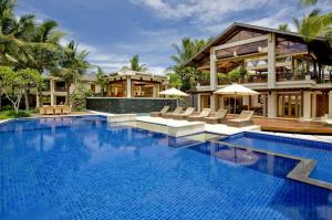 Bazén v ubytování Paradise Island Estate nebo v jeho okolí