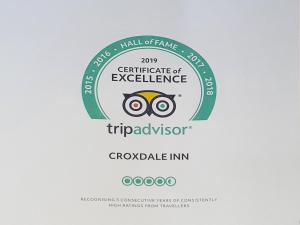a logo for the centennial of excellence triadvisor at Croxdale Inn in Durham