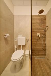 Kúpeľňa v ubytovaní Familia Panzió & Apartmanház Győr