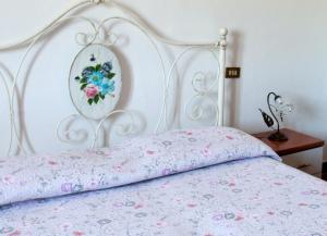 Postel nebo postele na pokoji v ubytování Casa Il Ceppo