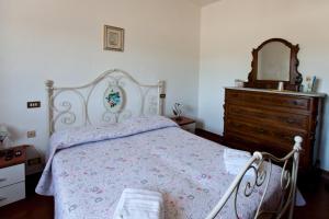 Postel nebo postele na pokoji v ubytování Casa Il Ceppo