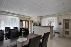 Posedenie v ubytovaní Familia Panzió & Apartmanház Győr