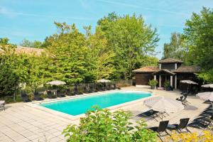 The swimming pool at or close to Domaine du Gouverneur, Hôtel, Restaurant & Golf