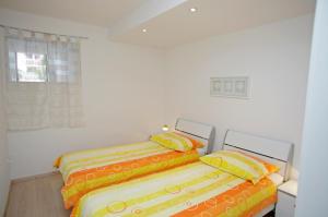 Cama o camas de una habitación en Apartments Armonia