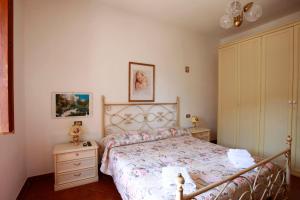 Postel nebo postele na pokoji v ubytování Casa Il Ceppo